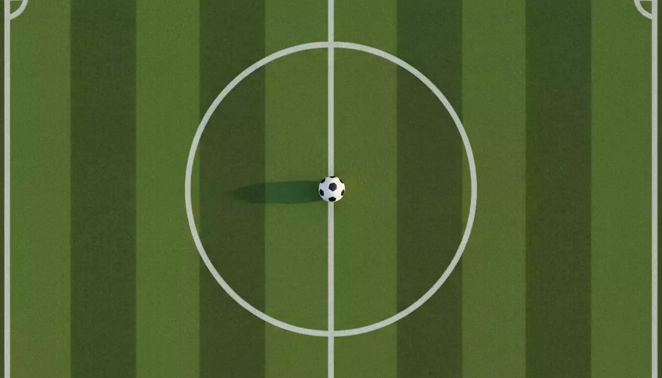 Campo di calcio visto dall'alto con linee del campo e pallone al centro